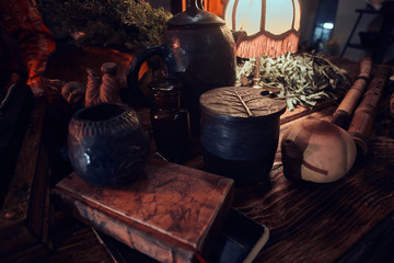 Ancient Chinese Medicine. Close-up view of a wooden table with various accessories 