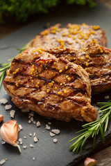 Grilled beef steaks with spices.