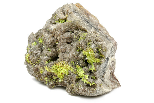 autunite (uranium ore) from Vogtland, Germany isolated on white background