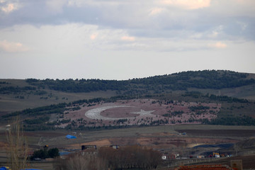 big turkish flag on the hill,