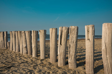 row breakwaters on the beach of Cadzand Bad, The Netherlands