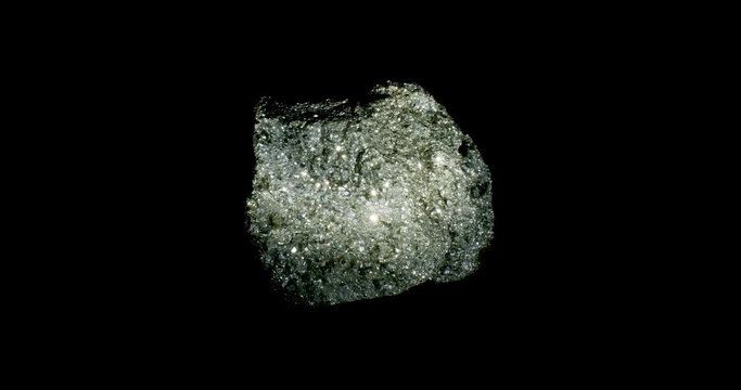 Pyrite Mineral Turning on Black