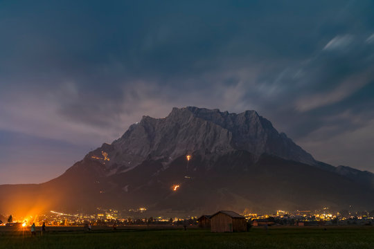 Austria, Lermoos, Ehrwalder Becken, Ehrwald with midsummer fire, Zugspitze