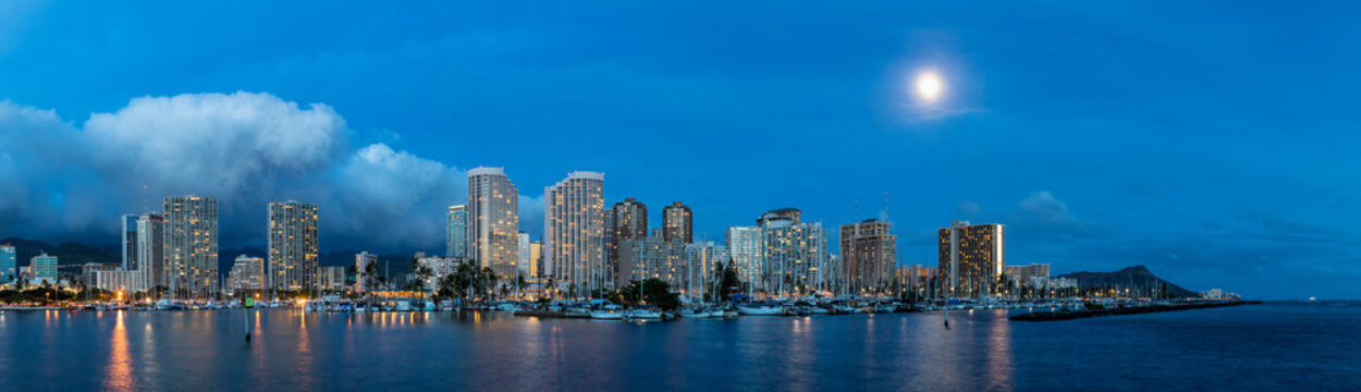 USA, Hawaii Oahu, Honolulu, Skyline with Ala Wai Boat Harbor and Diamond Head at blue hour