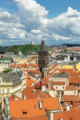 Naklejka na ściany i meble The Prague Powder Tower rises on the roofs of houses