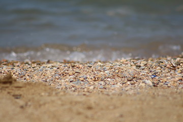 Fototapeta na wymiar Pebbles on the beach 2