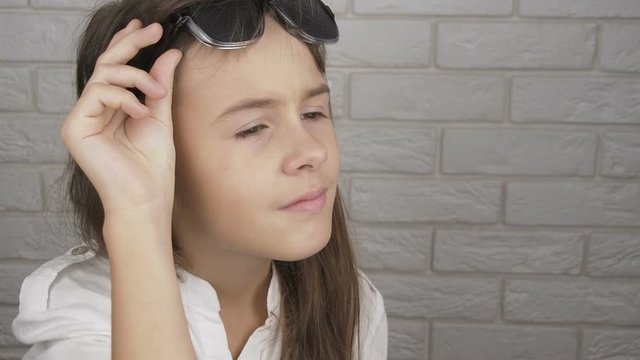 Eyeglasses for vision correction. Girl in obscura glasses.
