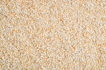 Top view. The surface of the heap of sesame seeds. Background. Close up, macro.