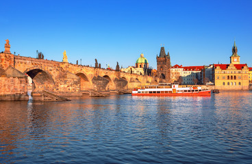 Scenic view Charles bridge and historical center of Prague, buildings and landmarks of old town at sunset, Prague, Czech Republic