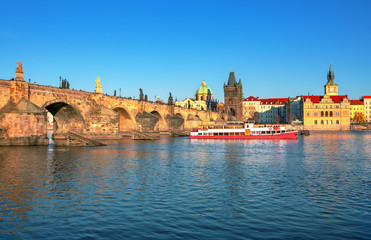 Scenic view Charles bridge and historical center of Prague, buildings and landmarks of old town at sunset, Prague, Czech Republic
