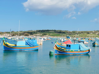 Fototapeta na wymiar Marsaxlokk Malta Village fishing boat