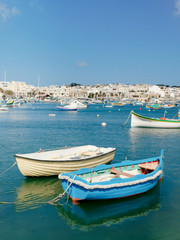 Fototapeta na wymiar Marsaxlokk Malta Village fishing boat