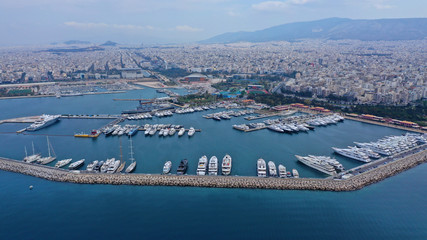 Aerial drone photo of famous Flisvos Marina with mega yachts and sail boats docked, Athens riviera,...