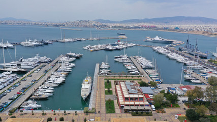 Aerial drone photo of famous Flisvos Marina with mega yachts and sail boats docked, Athens riviera, Attica, Greece