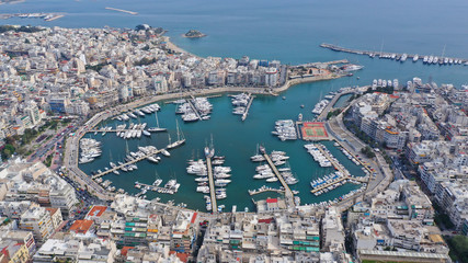 Aerial drone photo of famous busy port and safe dock of Bay of Zea or Pasalimani (Pasha's harbour) in the heart of Piraeus, Attica, Greece