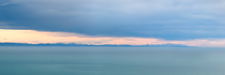 sea ocean and dark blue sky clouds