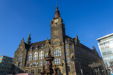Fototapeta premium Outdoor sunny view of walking street and plaza in front of city hall in old town of Wuppertal city, Germany.