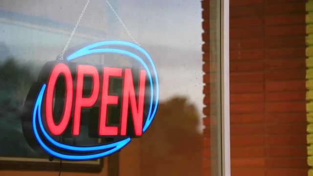 Close up, open sign on store in Lakeland