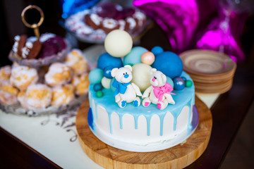 Colorful decoration of a first year birthday cake
