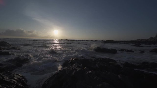 beautiful view at beach sides, slow waves motion hitting the rocks at Pantai Pandak, Terengganu