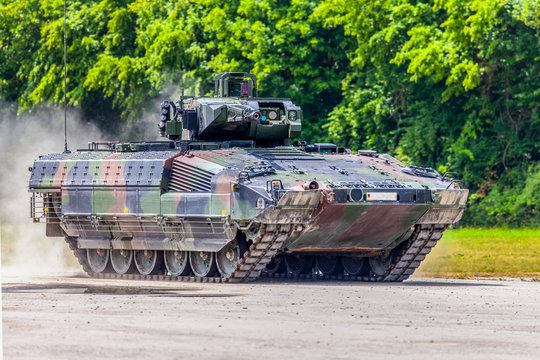 German infantry fighting vehicle drives on a street