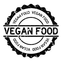 Grunge black vegan food word round rubber seal stamp on white background
