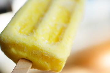 People are eating fruit flavored ice cream.