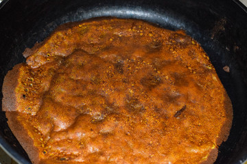 Frying pancakes on rye flour without butter in a pan with non stick coating