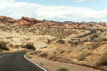 Curved road leading into the Valley of Fire State Park.