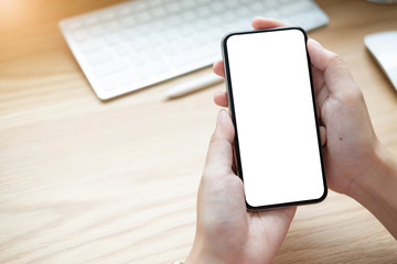 woman using Smartphone. Blank screen mobile phone for graphic display montage.networking service.