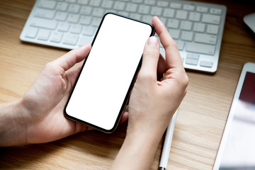 woman using Smartphone. Blank screen mobile phone for graphic display montage.networking service.