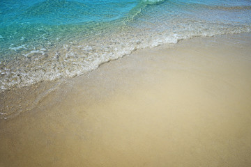Fototapeta na wymiar Soft blue wave of the sea. Summer background.