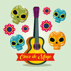 mexican guitar with flowers and skull decoration