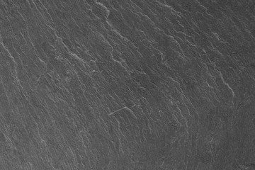 Dark grey black slate background or texture.