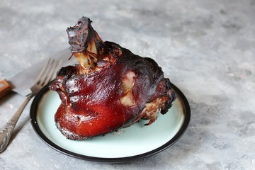 pork knuckle baked ham. copy space. keto diet, food rich in fats and proteins