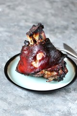 pork knuckle baked ham. copy space. keto diet, food rich in fats and proteins