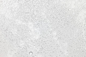 Water drops on glass, Rain droplets on glass background.