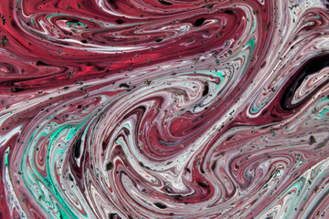 Beautiful abstract painting is a painting technique Ebru .Turkish Ebru style on the water with acrylic paints wring wave.Stylish combination of luxury.Contemporary art marble liquid texture