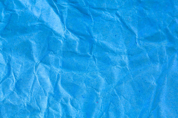 Texture crumpled blue paper background.