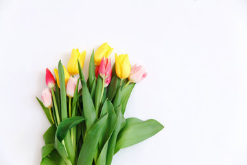 Bouquet of colored tulips on a white background. Spring flowers