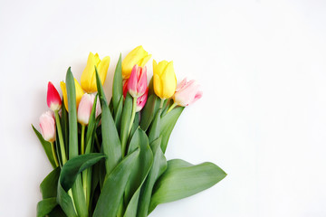 Bouquet of colored tulips on a white background. Spring flowers