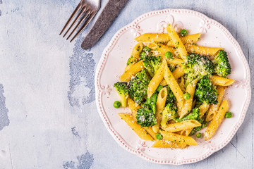 Pasta with broccoli, green peas, garlic, cheese.