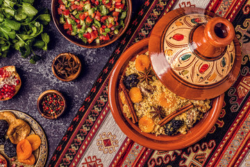 Traditional moroccan tajine of chicken with dried fruits and spices.