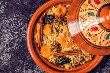 Traditional moroccan tajine of chicken with dried fruits and spices.