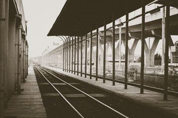 local railway station platform and traffic signage to stop people across the lanes simple architecture building design concept idea for transportation traveling