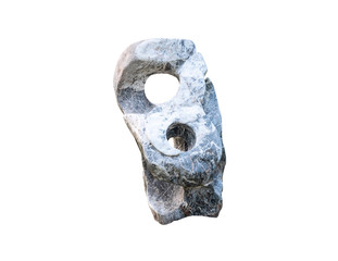 Abstract of big granite ,marble rock stone with holes in the garden zen japan style .Decorative Sculpture rock aged stone isolated on white background.Texture and background decoration at home concept