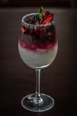 red cocktail with strawberry