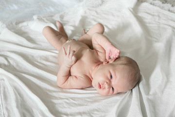 Newborn naked Baby girl on white background