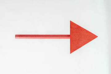 RED wooden arrow to the right