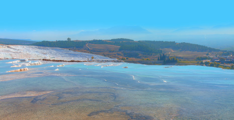 Natural travertine pools and terraces in Pamukkale. Cotton castle in southwestern Turkey